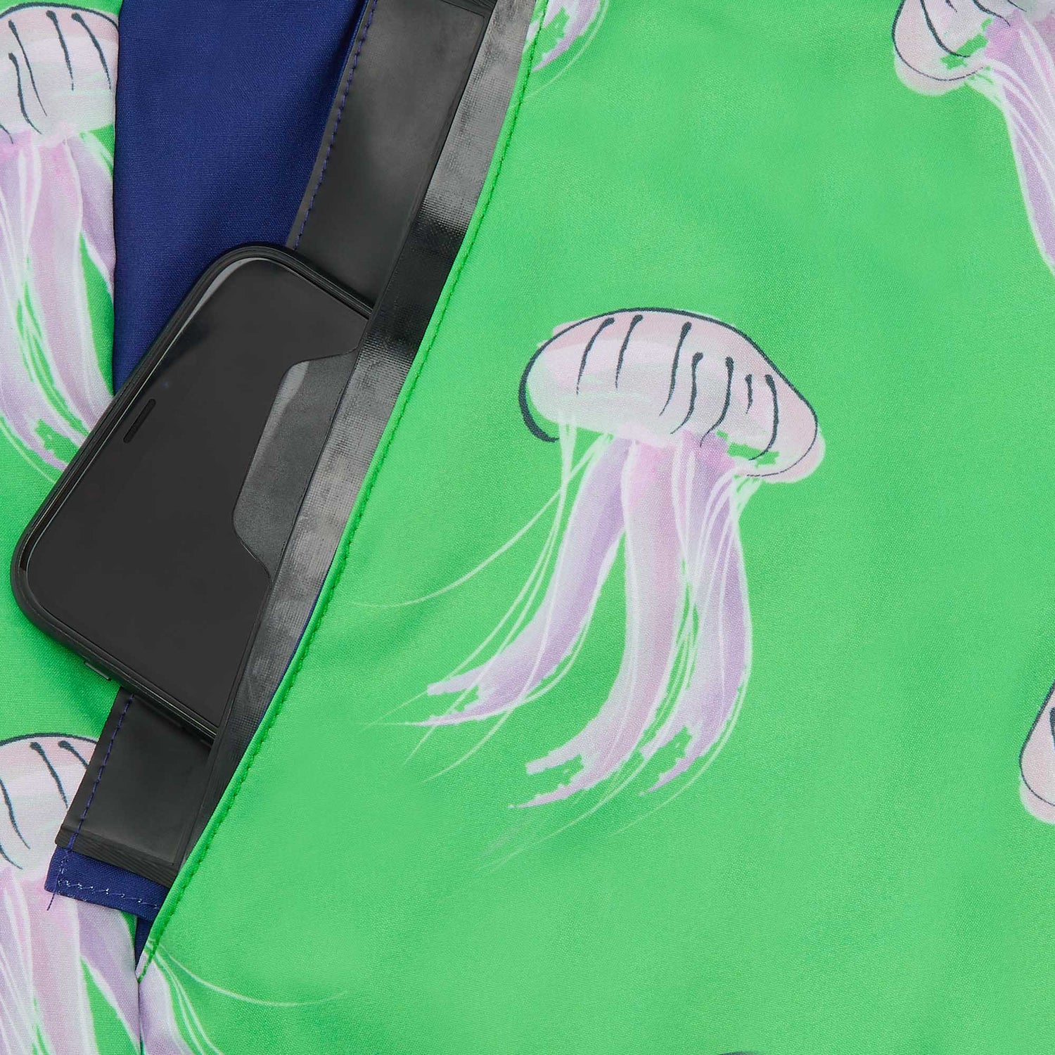 phone sitting inside waterproof pocket of swim shorts