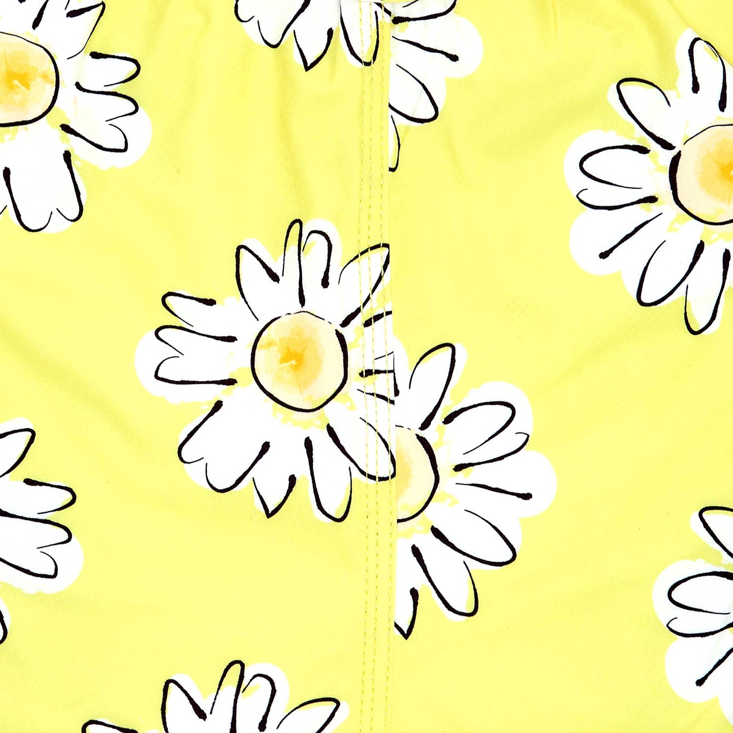 close up of daisy patter on swim shorts
